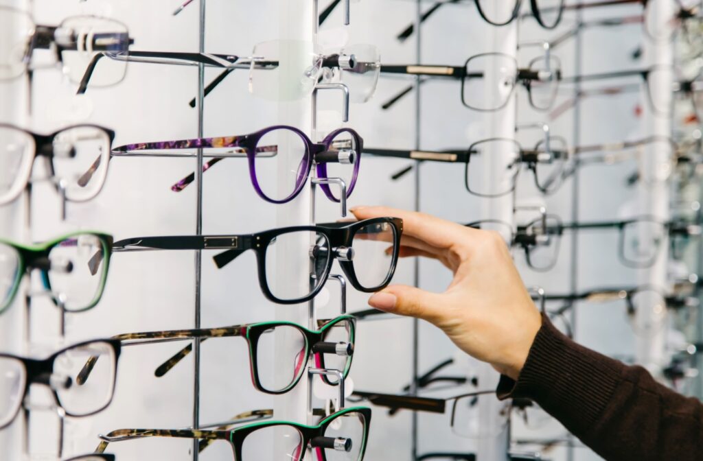 Selection of stylish eyeglass frames displayed in an optometry clinic.